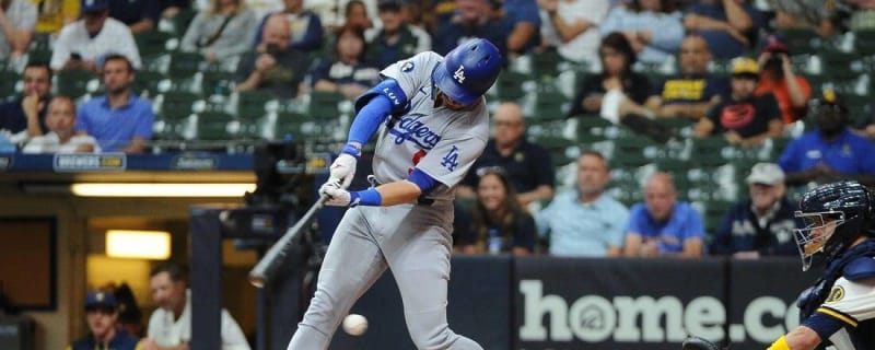 Victor Caratini's two-run single in 11th lifts Brewers over Dodgers