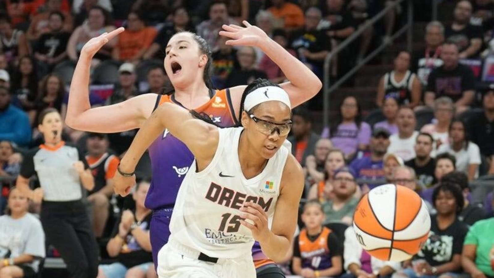 Dream hold on late to squeeze past Mystics