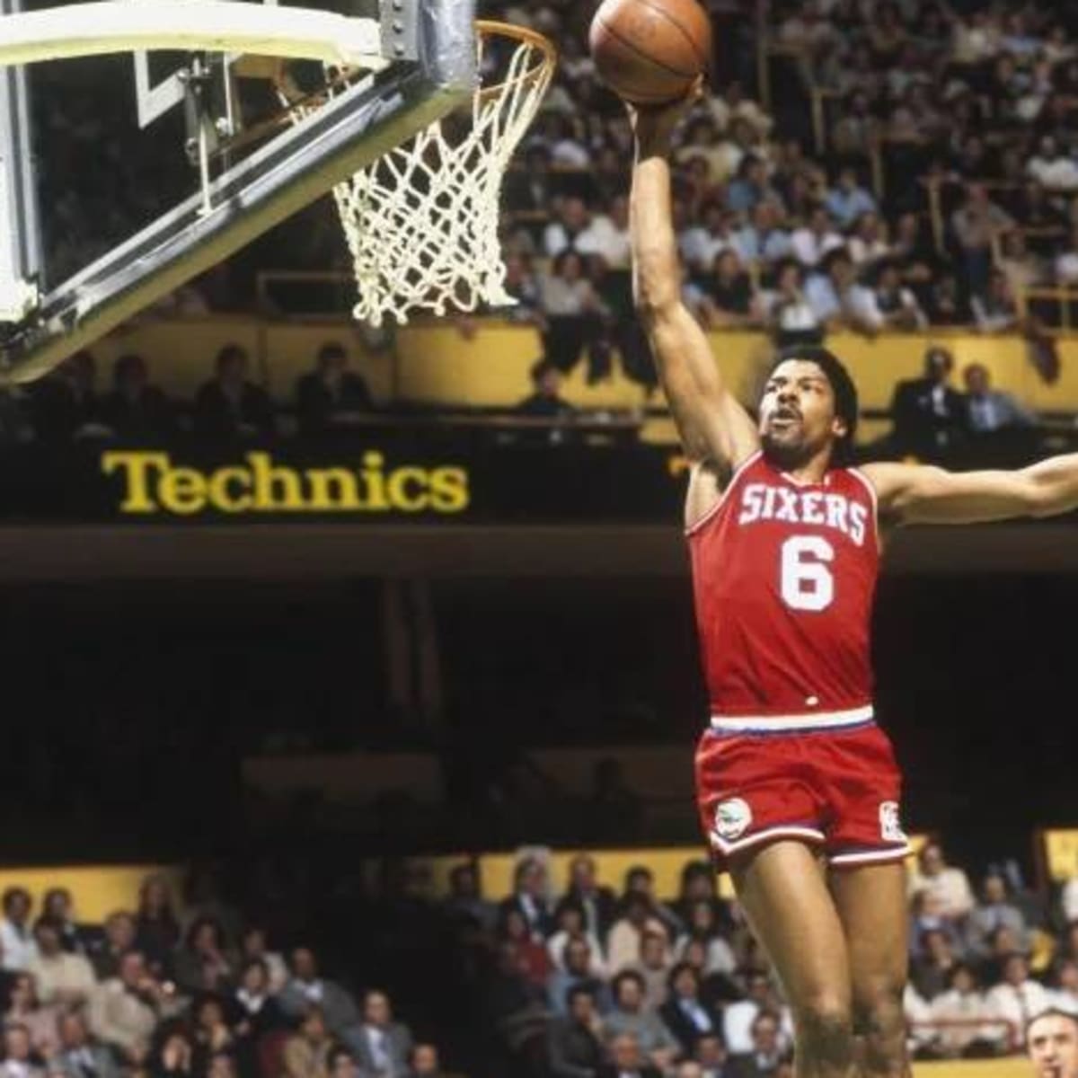 Julius Erving of the Philadelphia 76ers call out a play during a