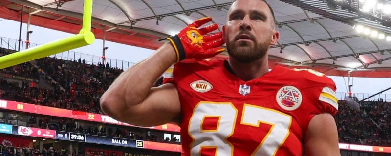 Travis Kelce slams a beer after receiving University of Cincinnati diploma