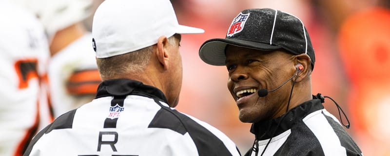 Referee Carl Johnson goes down with injury after running into Packers player vs. Lions