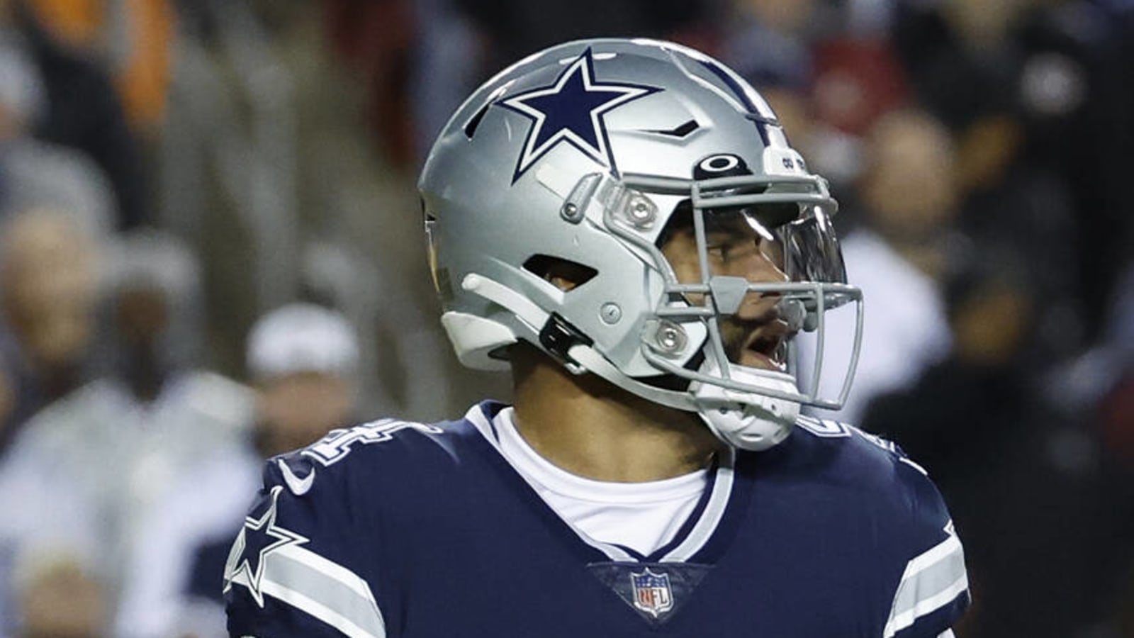 January 8, 2023 : Washington Commanders linebacker Khaleke Hudson (47)  applies pressure to Dallas Cowboys quarterback Dak Prescott (4) during the  game between the Dallas Cowboys and the Washington Commanders in Landover