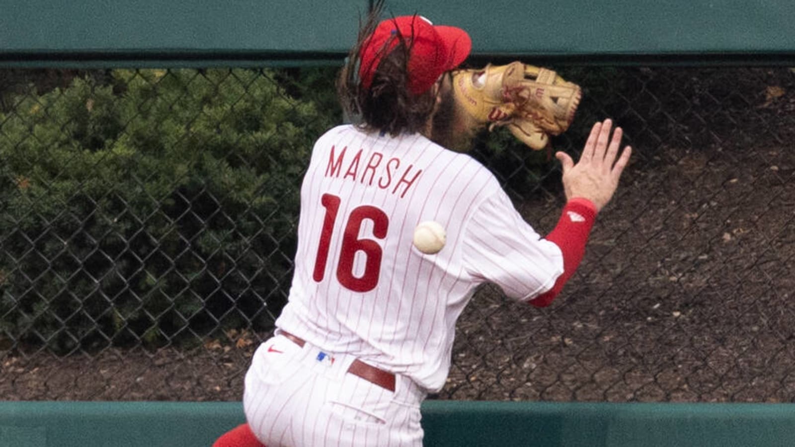What happened to Brandon Marsh? Phillies outfielder leaves game early with  injury after slamming into centerfield wall