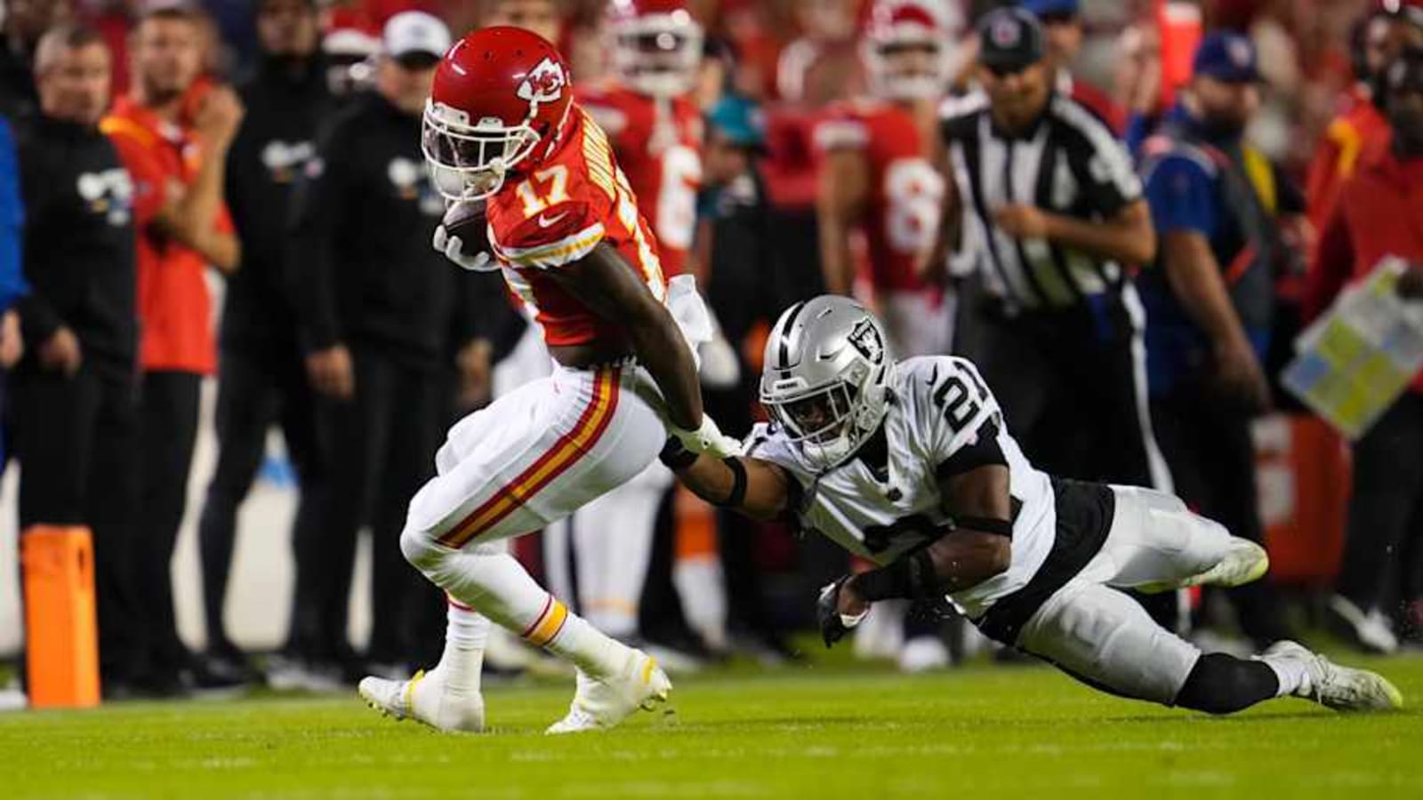 Who are the announcers and referees for Chiefs vs. Raiders today?