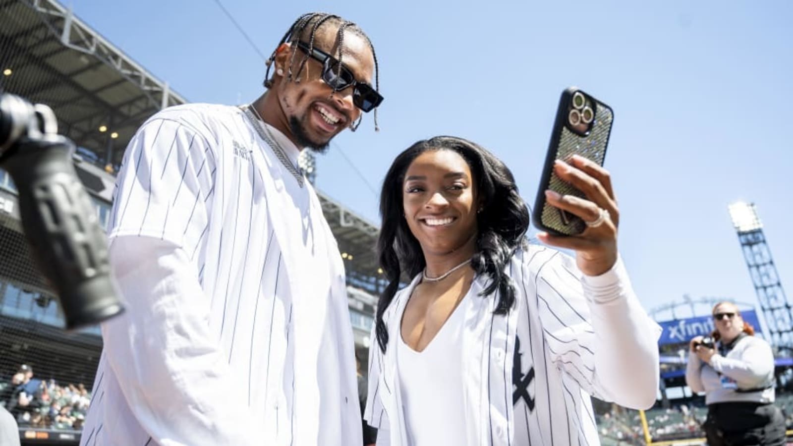 Simone Biles defends husband Jonathan Owens wearing her medals