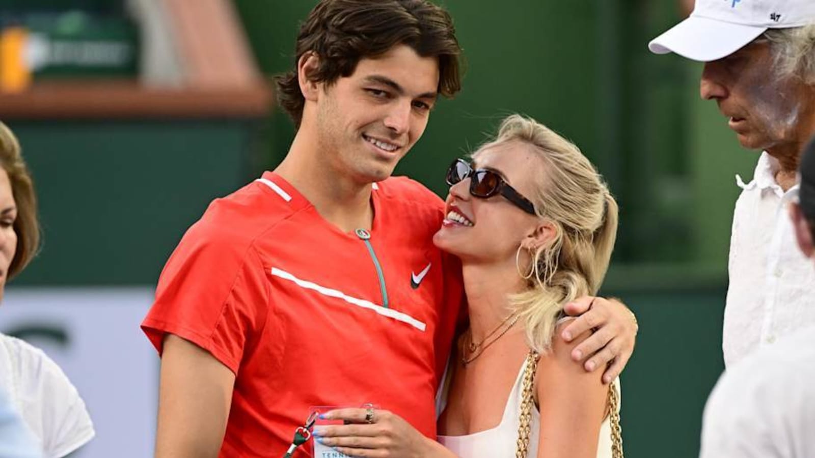 Taylor Fritz’s girlfriend Morgan Riddle braves Tokyo rain in exquisite white dress