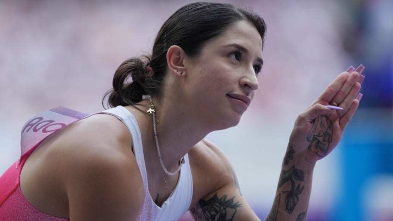 Ewa Swoboda, tattooed Polish Olympian, challenges IShowSpeed to race