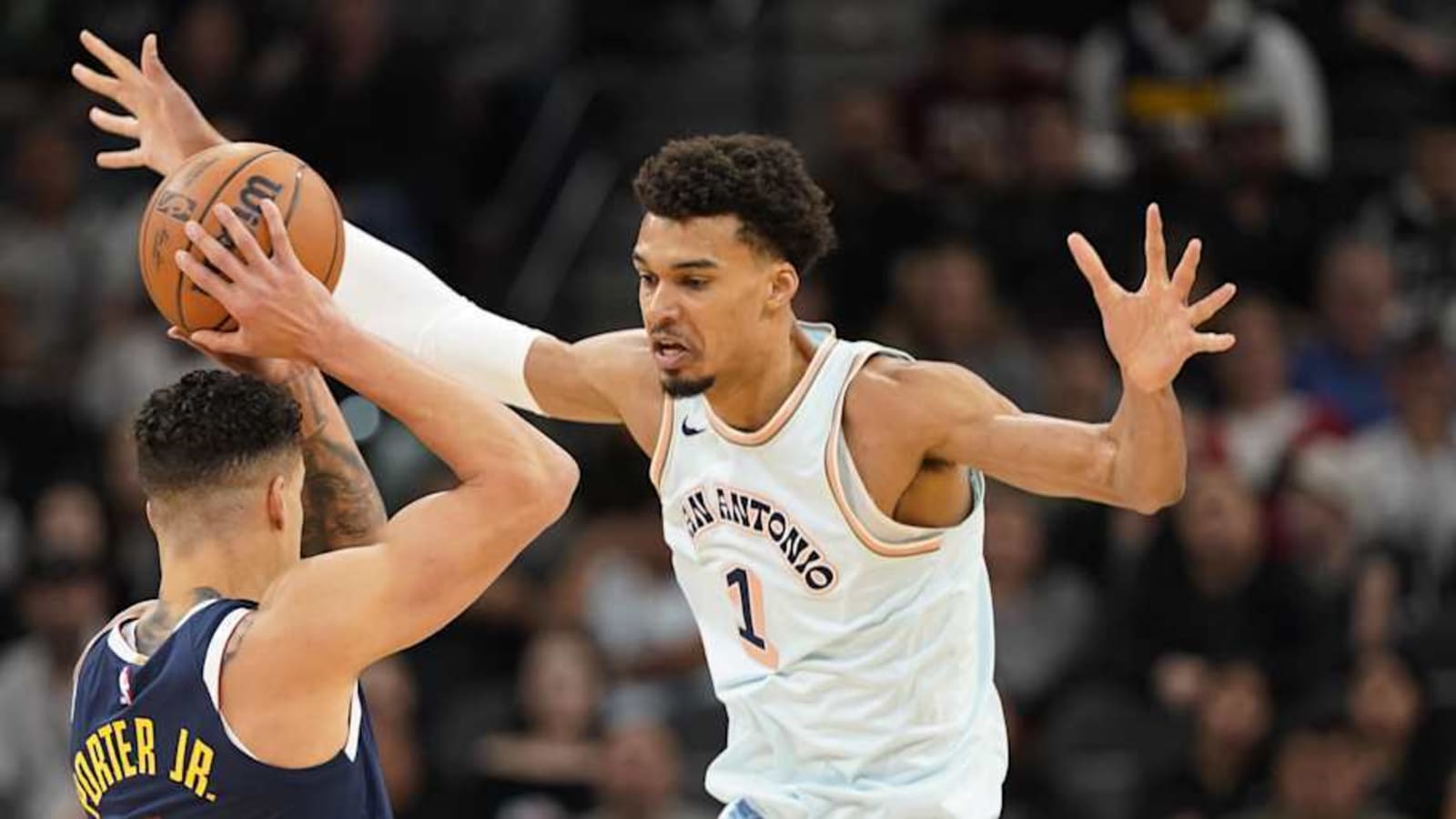 San Antonio falls to Denver in OT 122-111