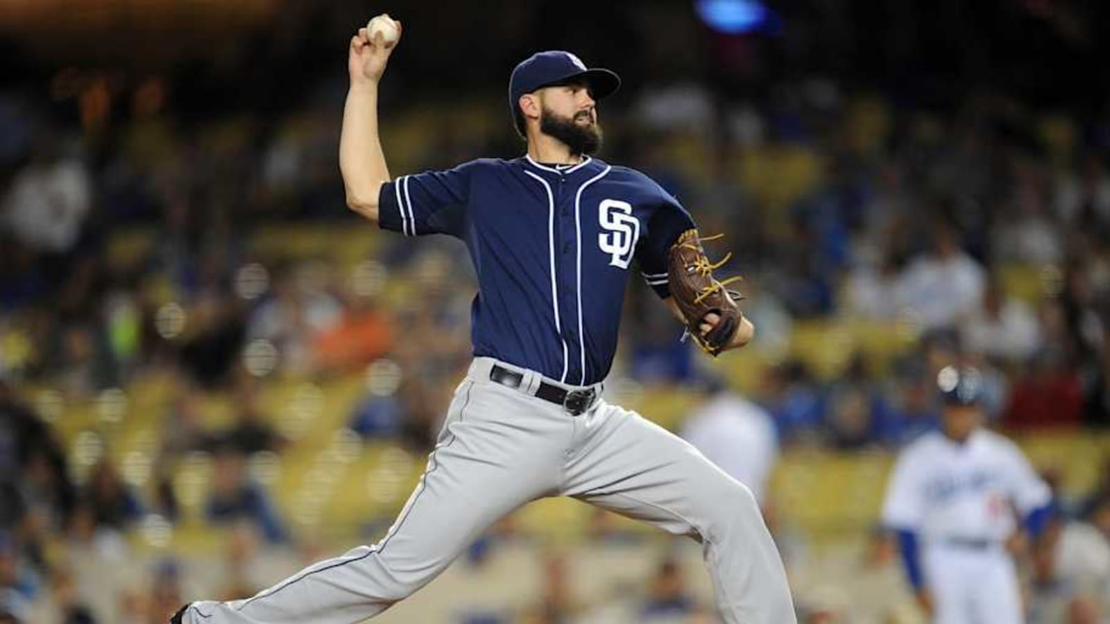 Former Padres Pitcher Acquired in Blockbuster Trade Signs With NL West Rival