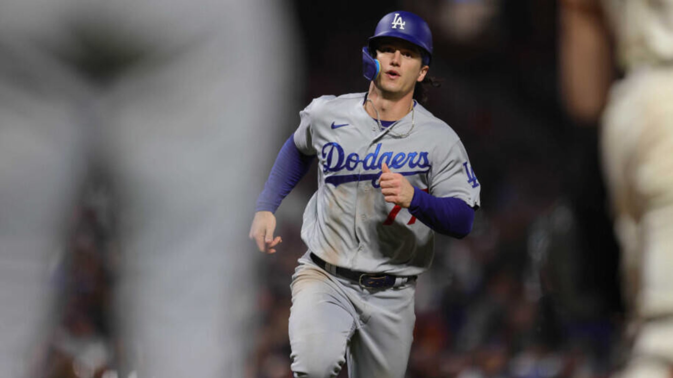 James Outman of the Los Angeles Dodgers runs to third base on a