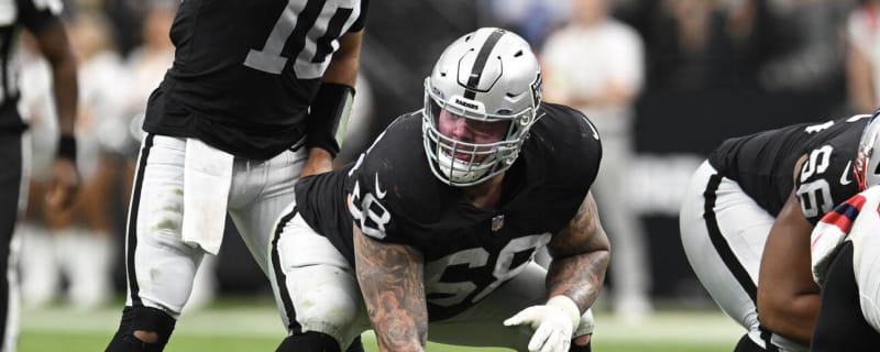 Raiders re-sign C Andre James