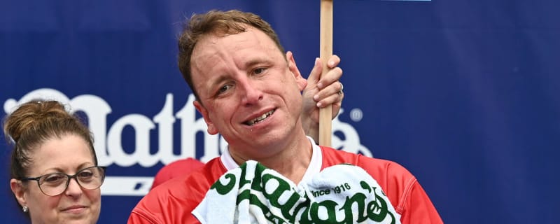 Joey Chestnut wins 16th hot dog eating contest after lightning delay