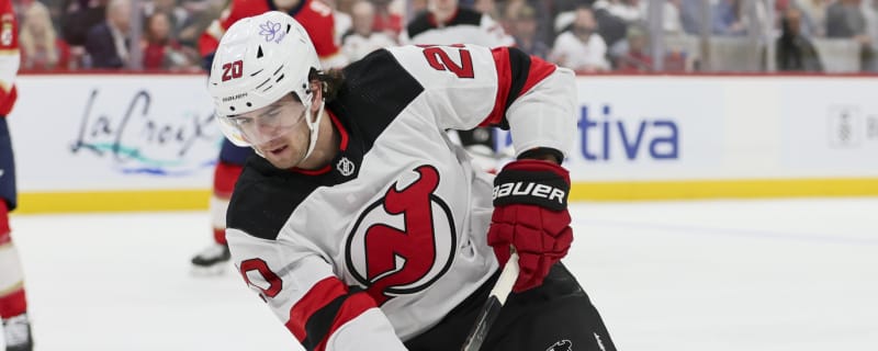 Michael McLeod signs in Kazakhstan while awaiting trial