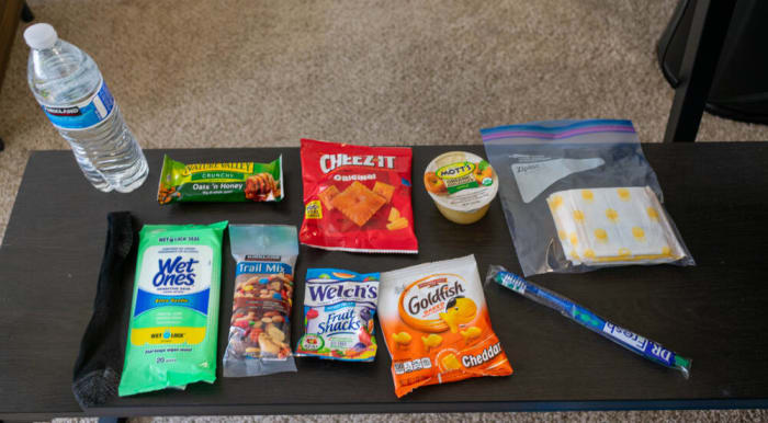 Stock your car with supply bags for unhoused people