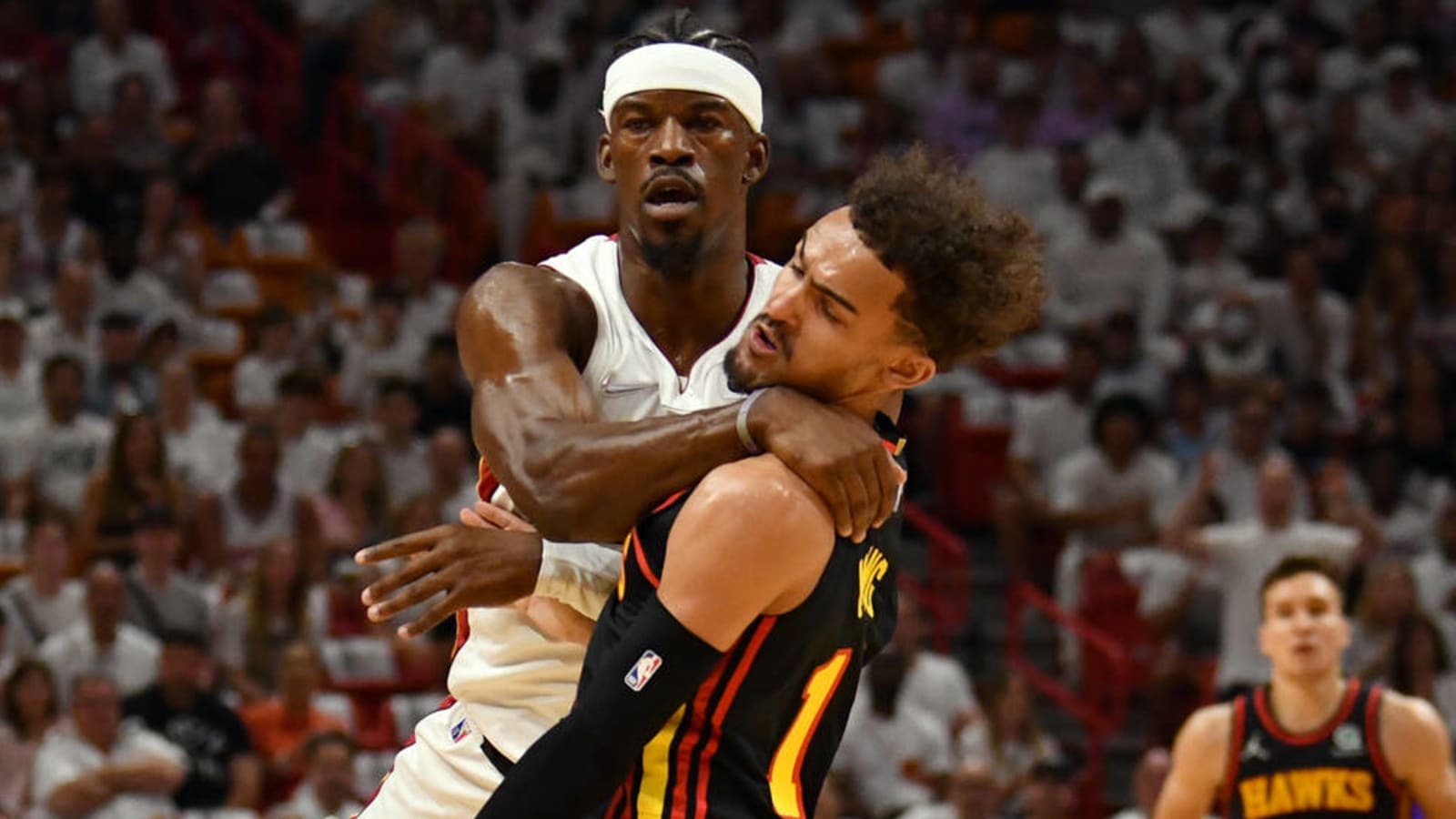 Watch: Jimmy Butler, Trae Young get into it early in Game 1