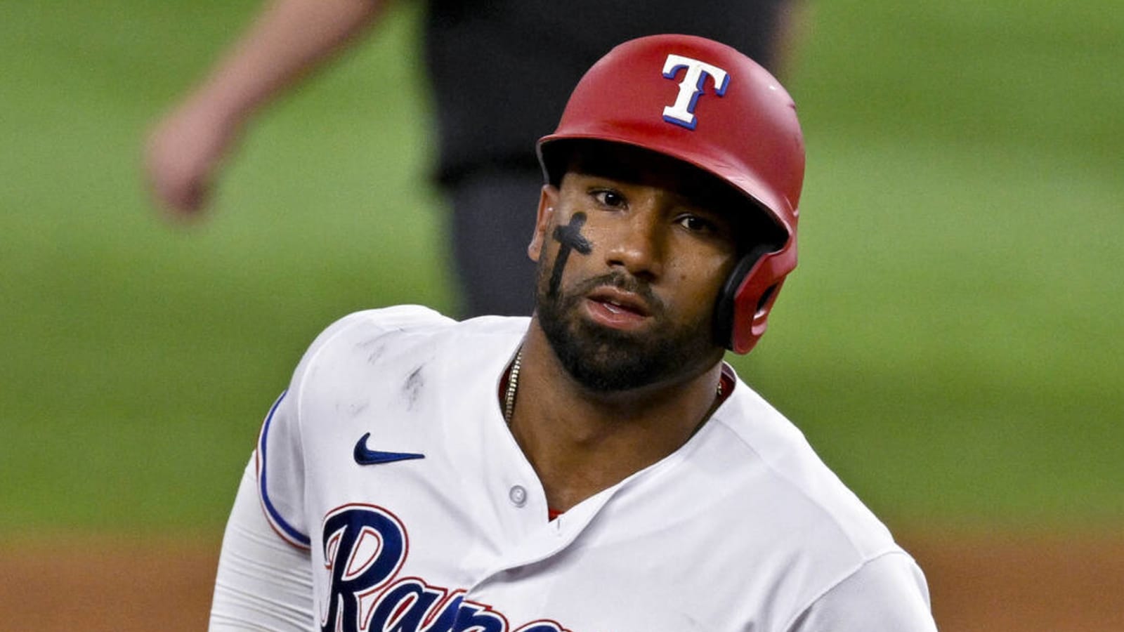 Texas Rangers' Ezequiel Duran looks up after hitting a single