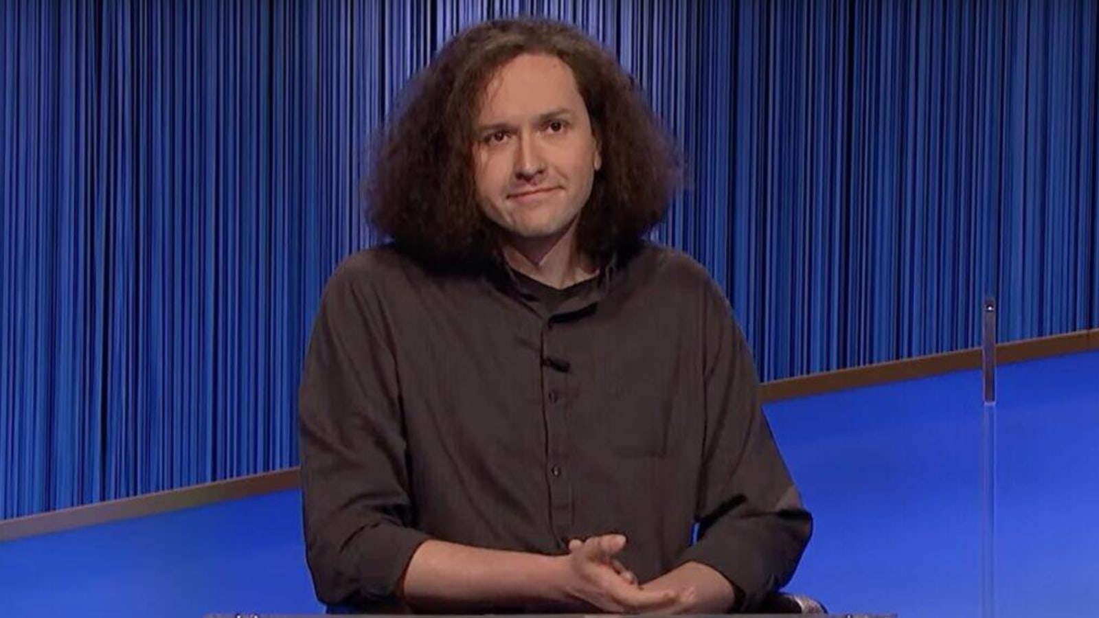 Jeopardy!' Champion Grant DeYoung Explains Why He Sits on Show 