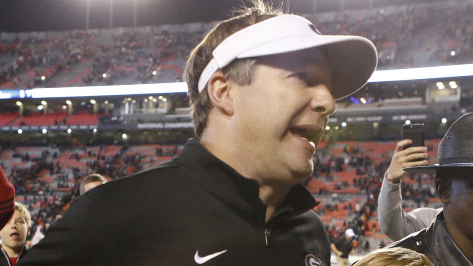 Watch: Kirby Smart falls down after chest-bump celebration with Travon Walker