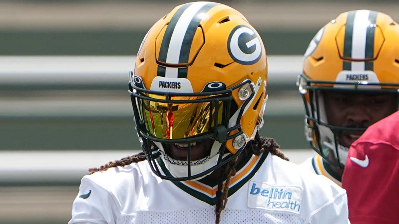 Packers surprise high school football teams with new helmets, visit from AJ  Dillon