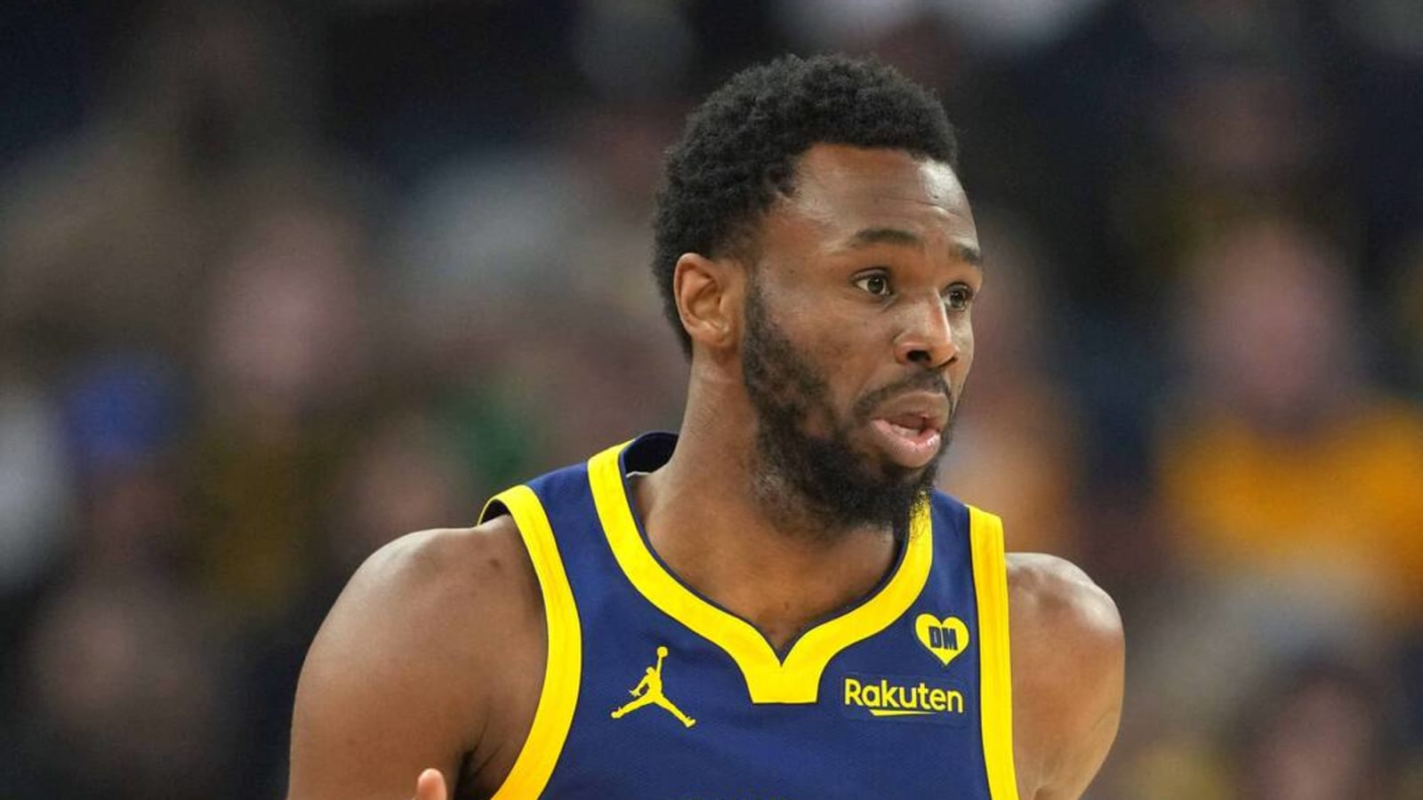 Andrew Wiggins reports back to Warriors after absence
