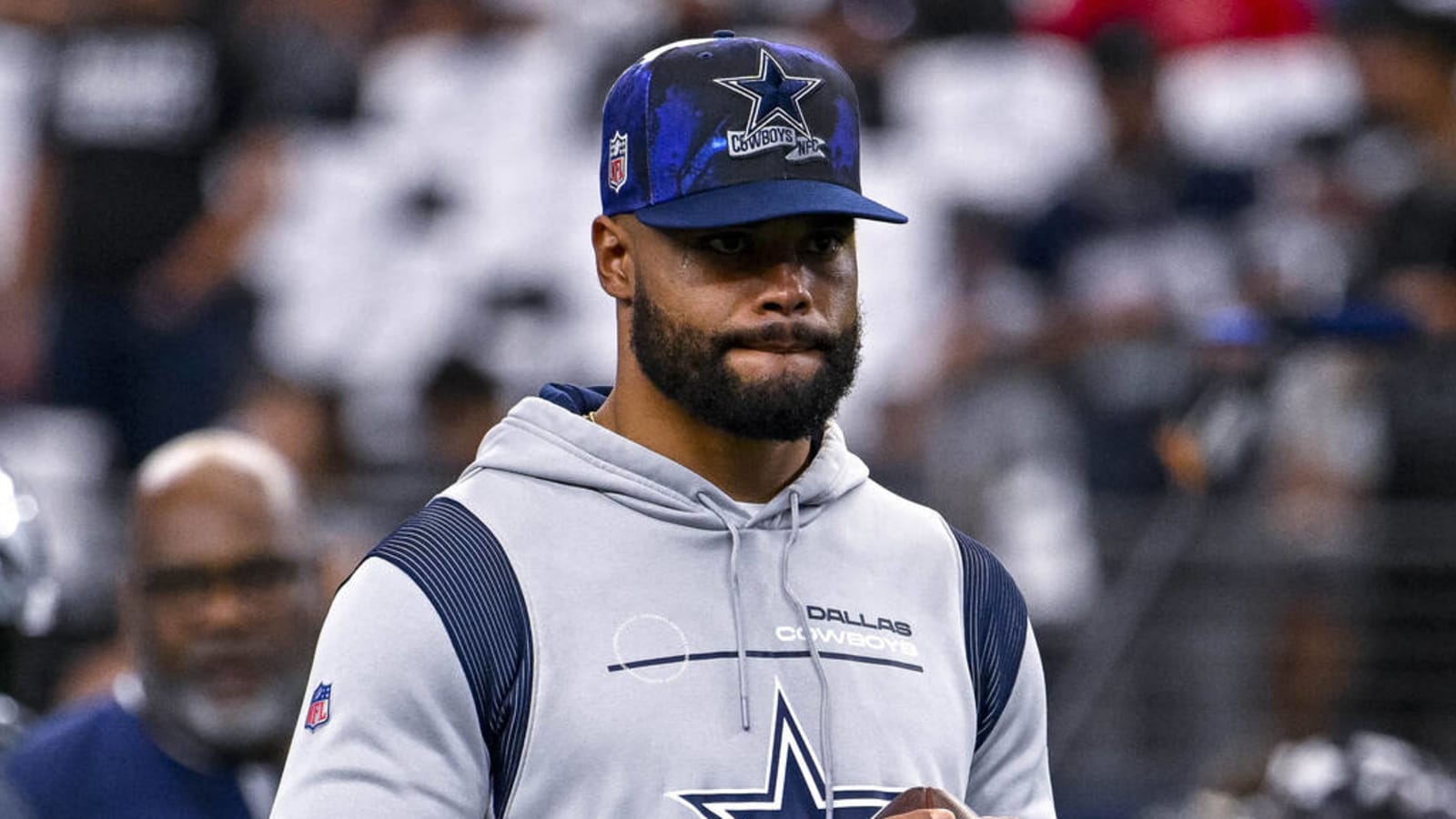 Dallas Cowboys quarterback Dak Prescott steps off the riser after