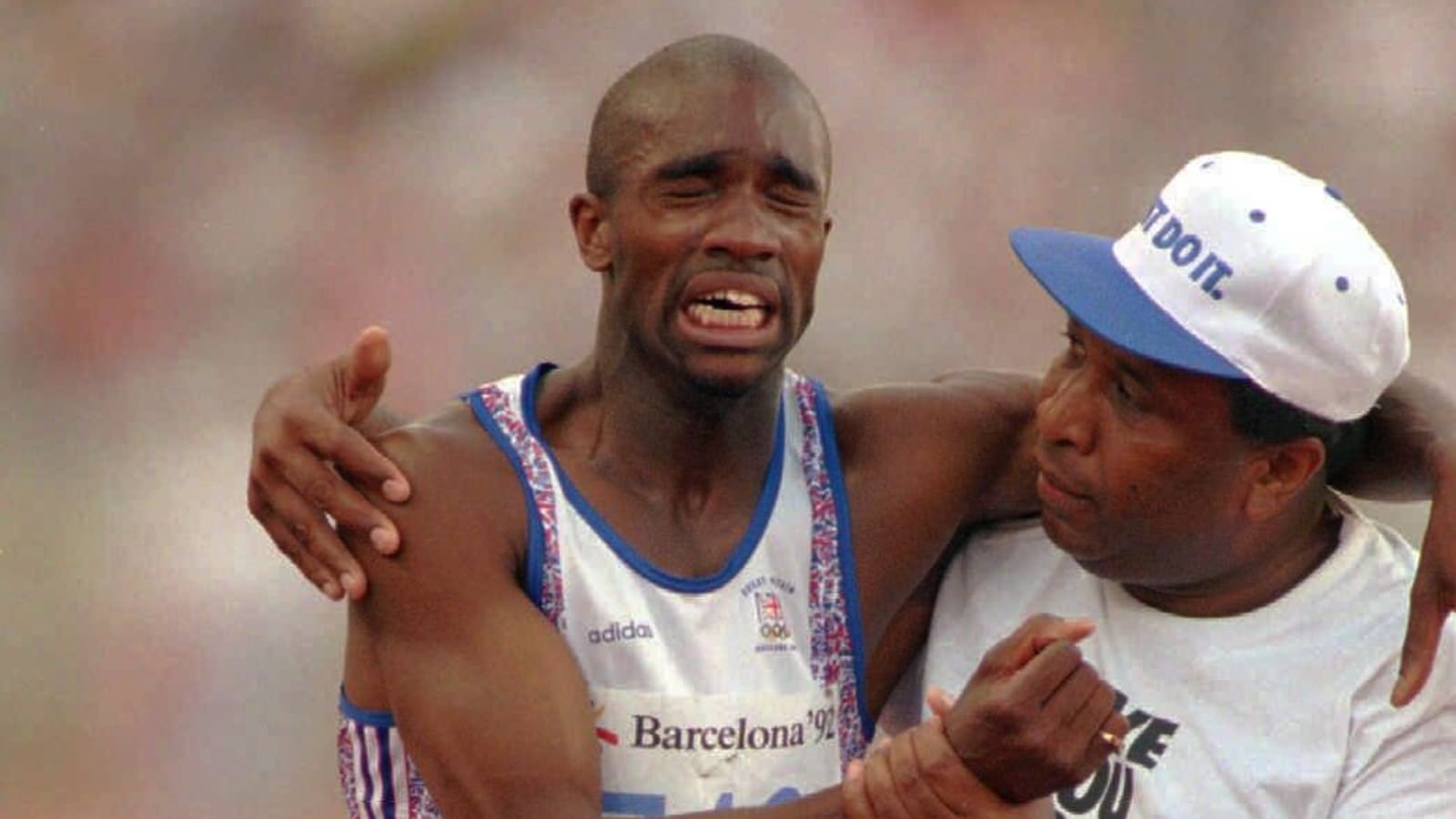 Father who helped son cross finish line at '92 Olympics dies