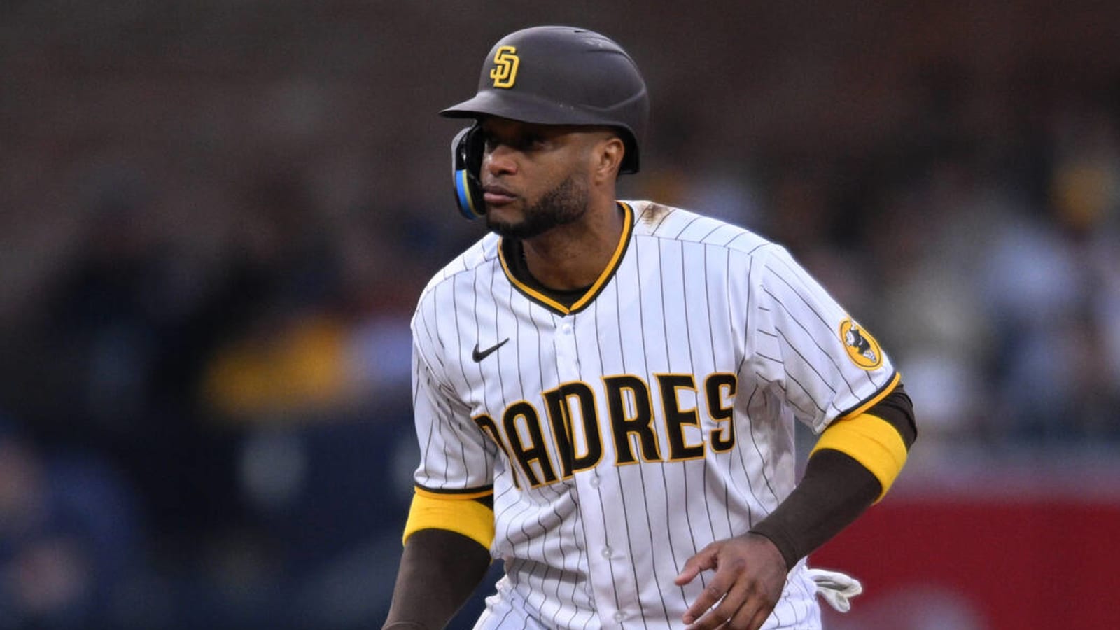 Minor league baseball team wearing jersey covered in emojis