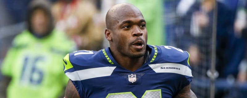 Adrian Peterson reacts after MVP, ROTY trophies go up for sale