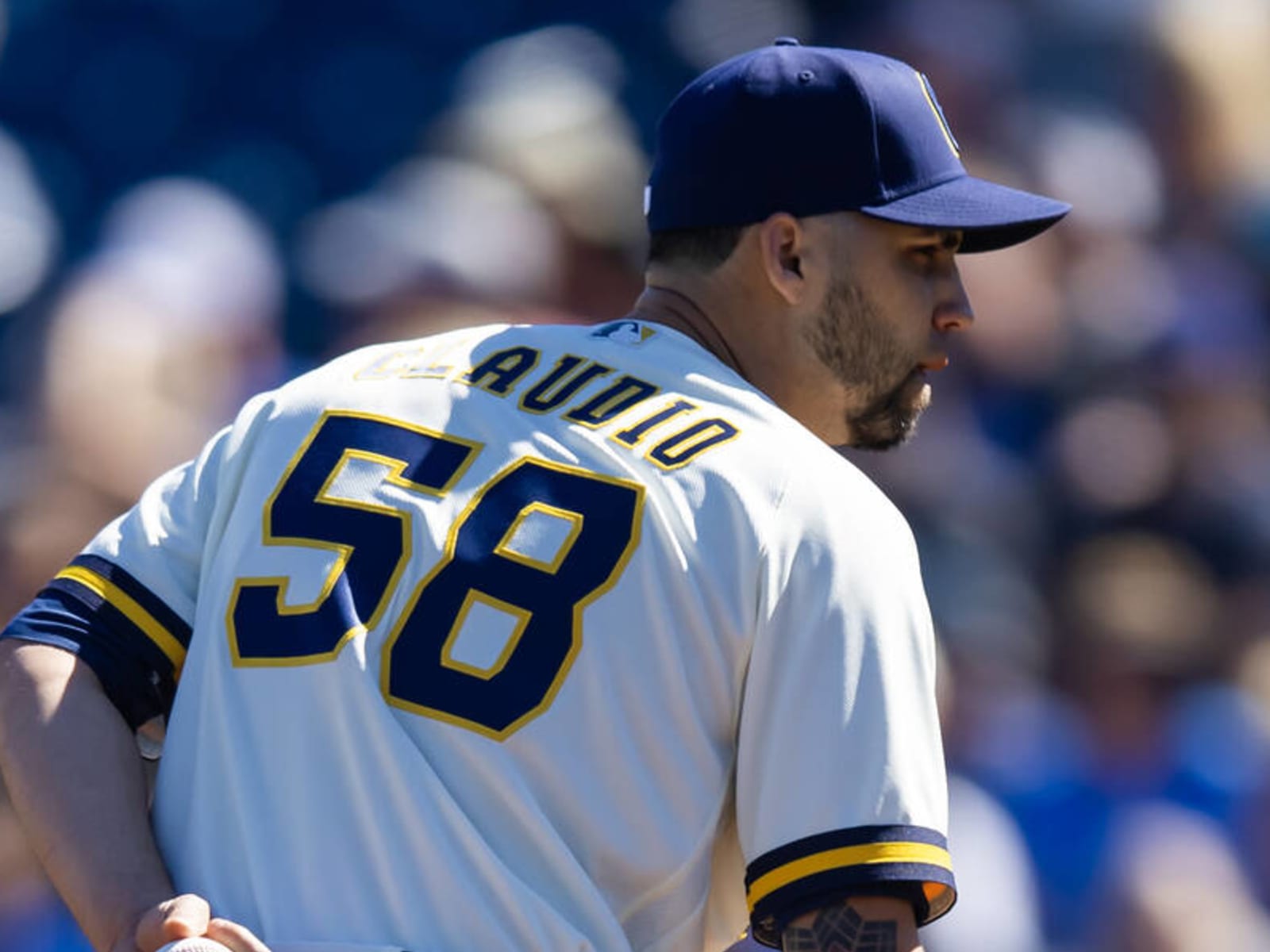 Brewers' Willy Adames exits game after being struck by a foul ball in the  dugout