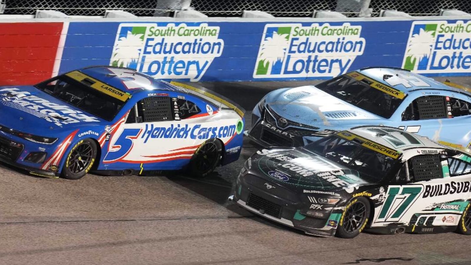 Kyle Larson’s spotter Tyler Monn met with Chris Buescher’s spotter after Kansas finish