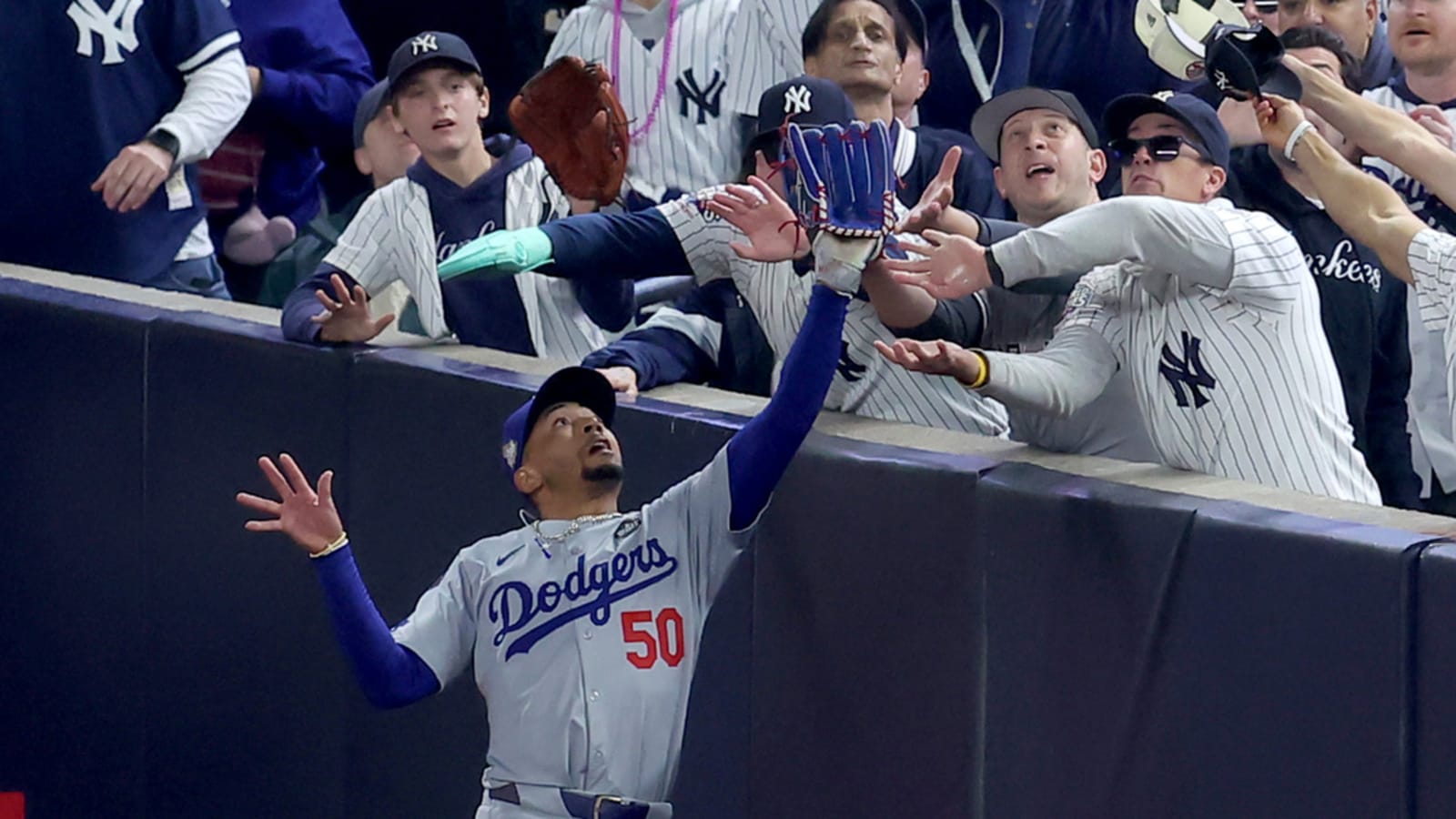 Watch: Yankees fans interfere with Mookie Betts, try to steal ball from glove