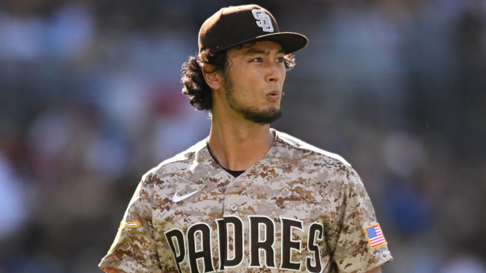 Yu Darvish of the San Diego Padres looks to the outfield during