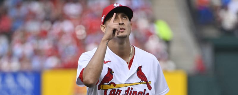 Cardinals reliever Gallegos gets wiped down by umpire after using rosin bag  on his left arm