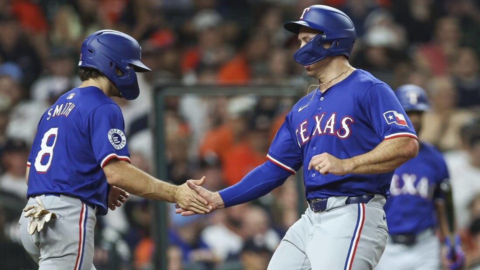 Rangers ride 6-run inning to win over Astros