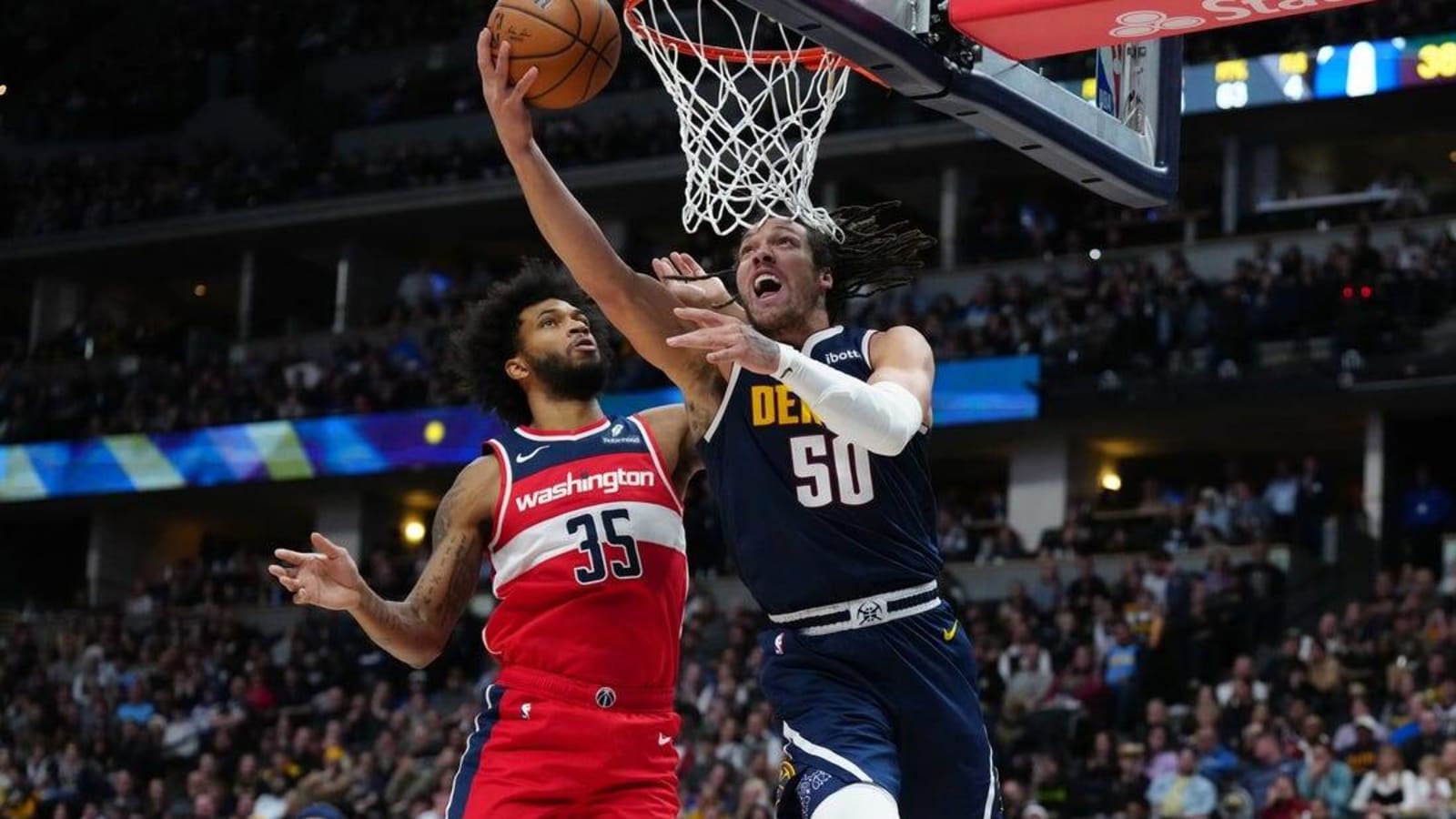 Nuggets wallop Wizards behind Nikola Jokic&#39;s triple-double