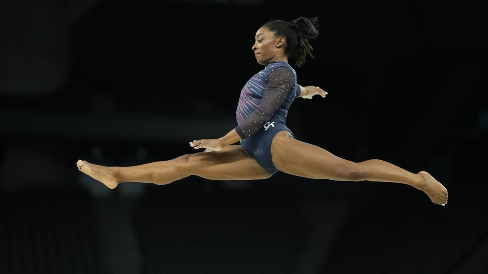 Simone Biles shakes off ankle pain, qualifies first for Olympics all-around