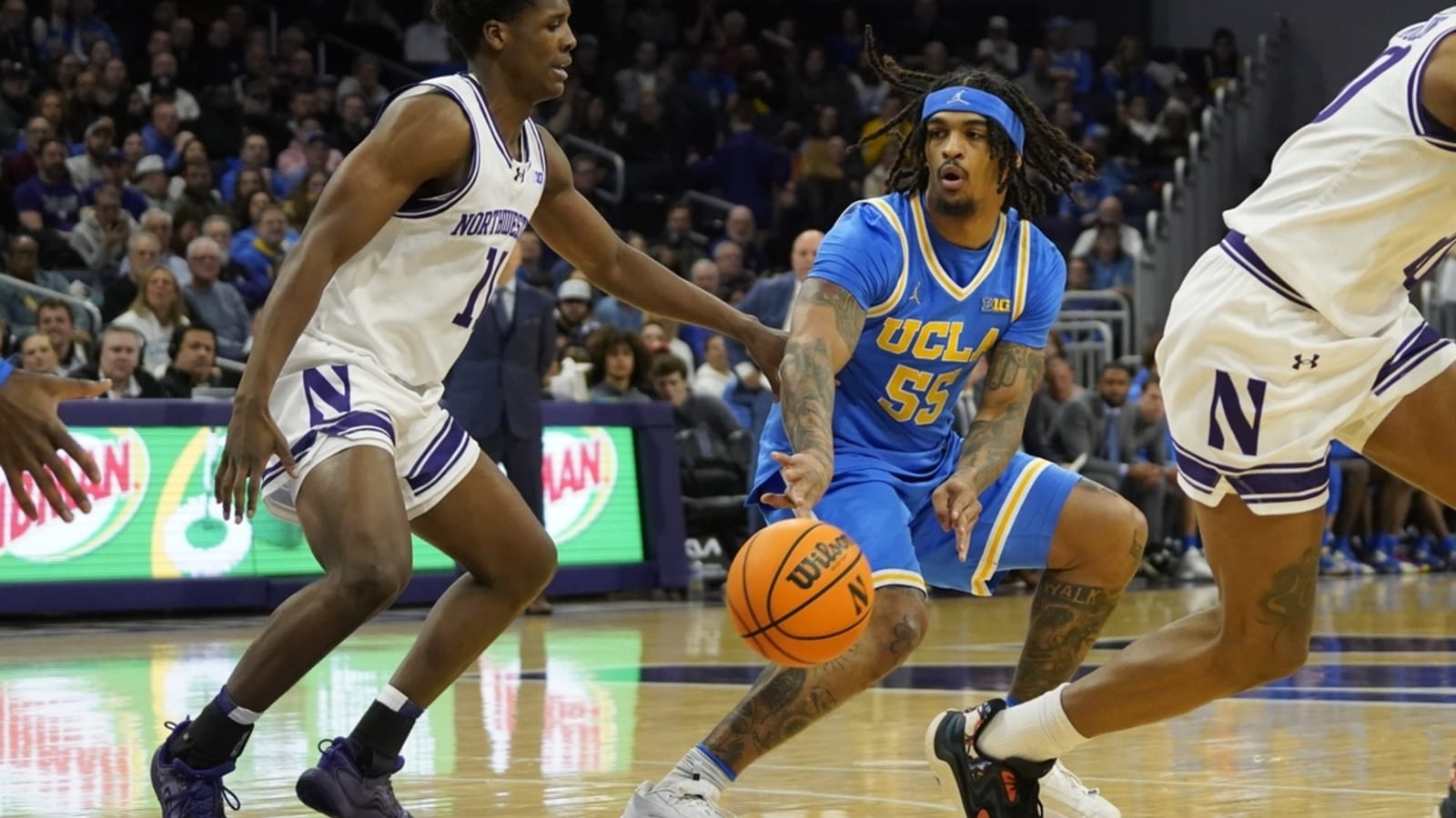 Up 14 late, UCLA withstands Northwestern rally