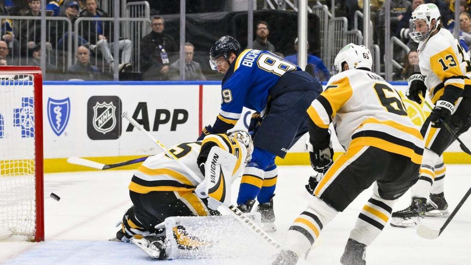 Blues top Penguins in OT, tie team mark with 11th straight win