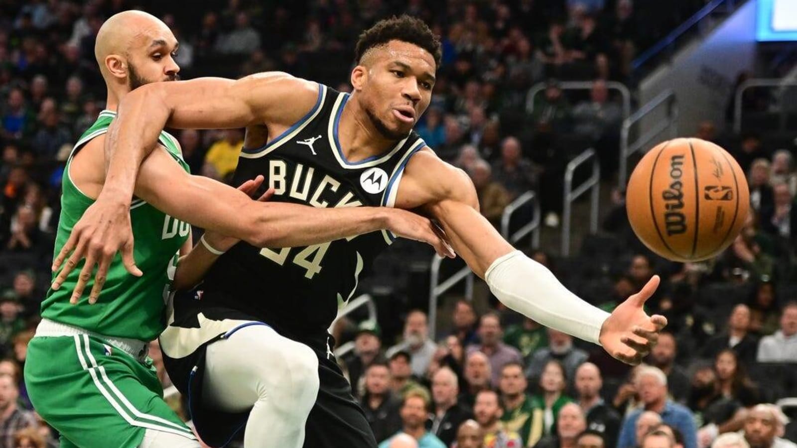 Giannis Antetokounmpo exits, but Bucks top Celtics