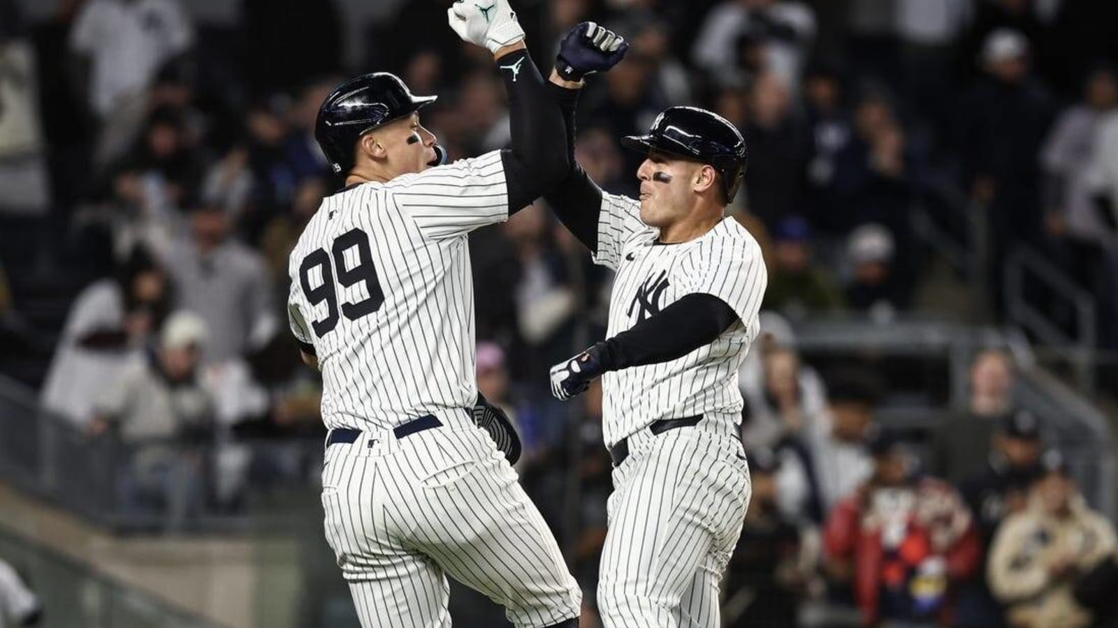 Yankees flex enough power to hold off Blue Jays