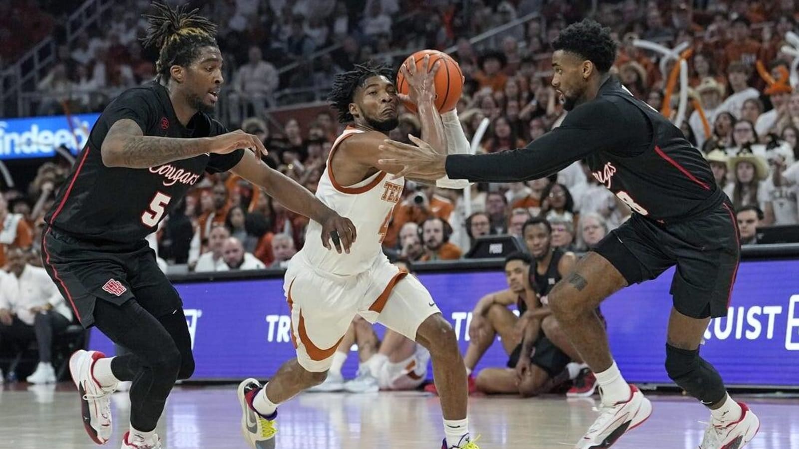 No. 4 Houston outlasts struggling Texas in OT