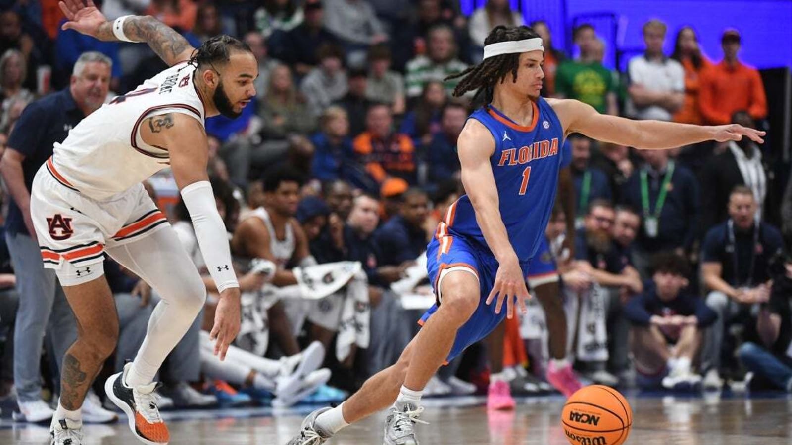 Nearly neighbors and teammates, Johni Broome, Walter Clayton Jr. share Final Four stage