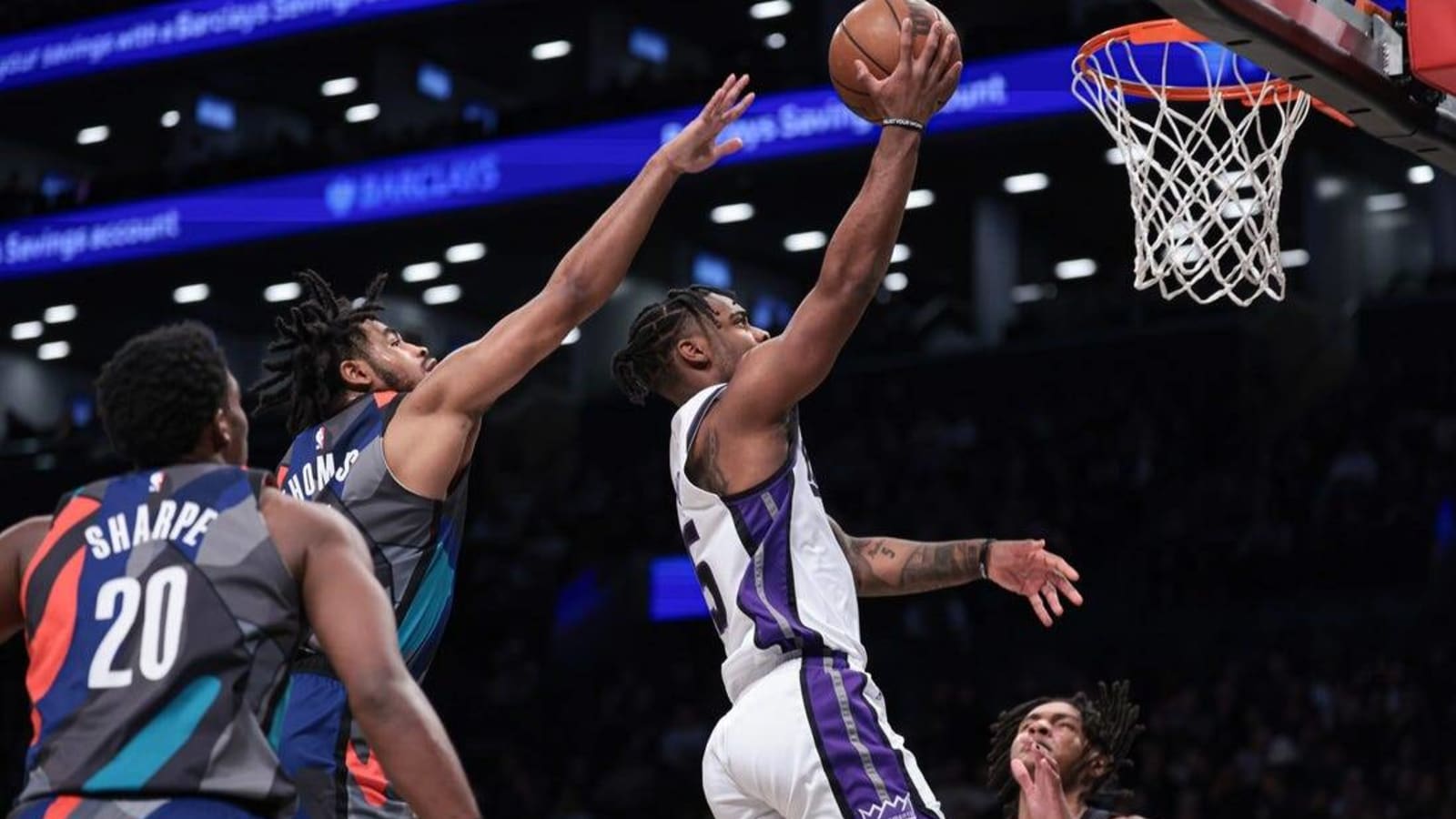 Kings roll past Nets to sweep season series