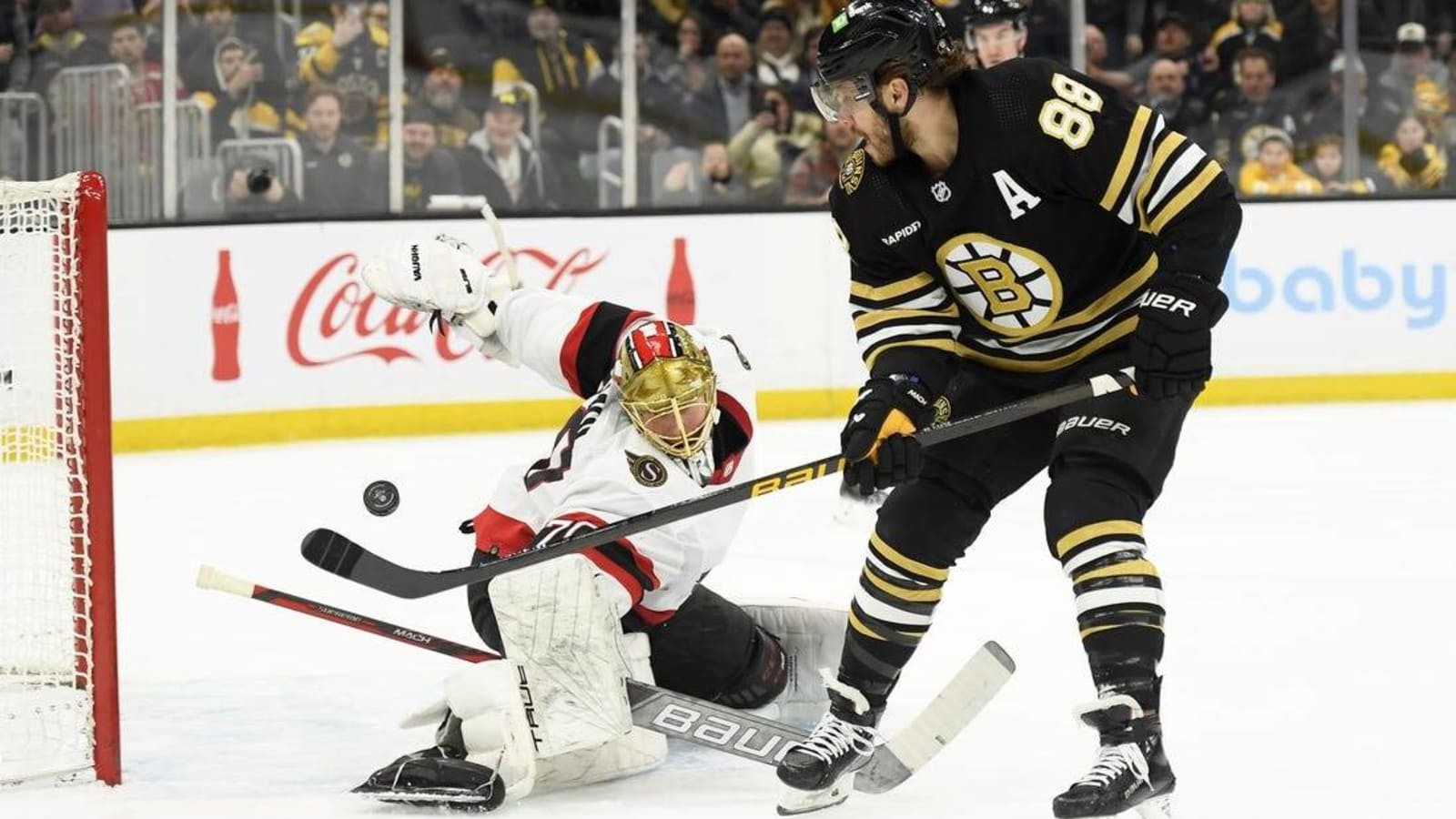 Bruins ride David Pastrnak&#39;s hat trick to win over Senators