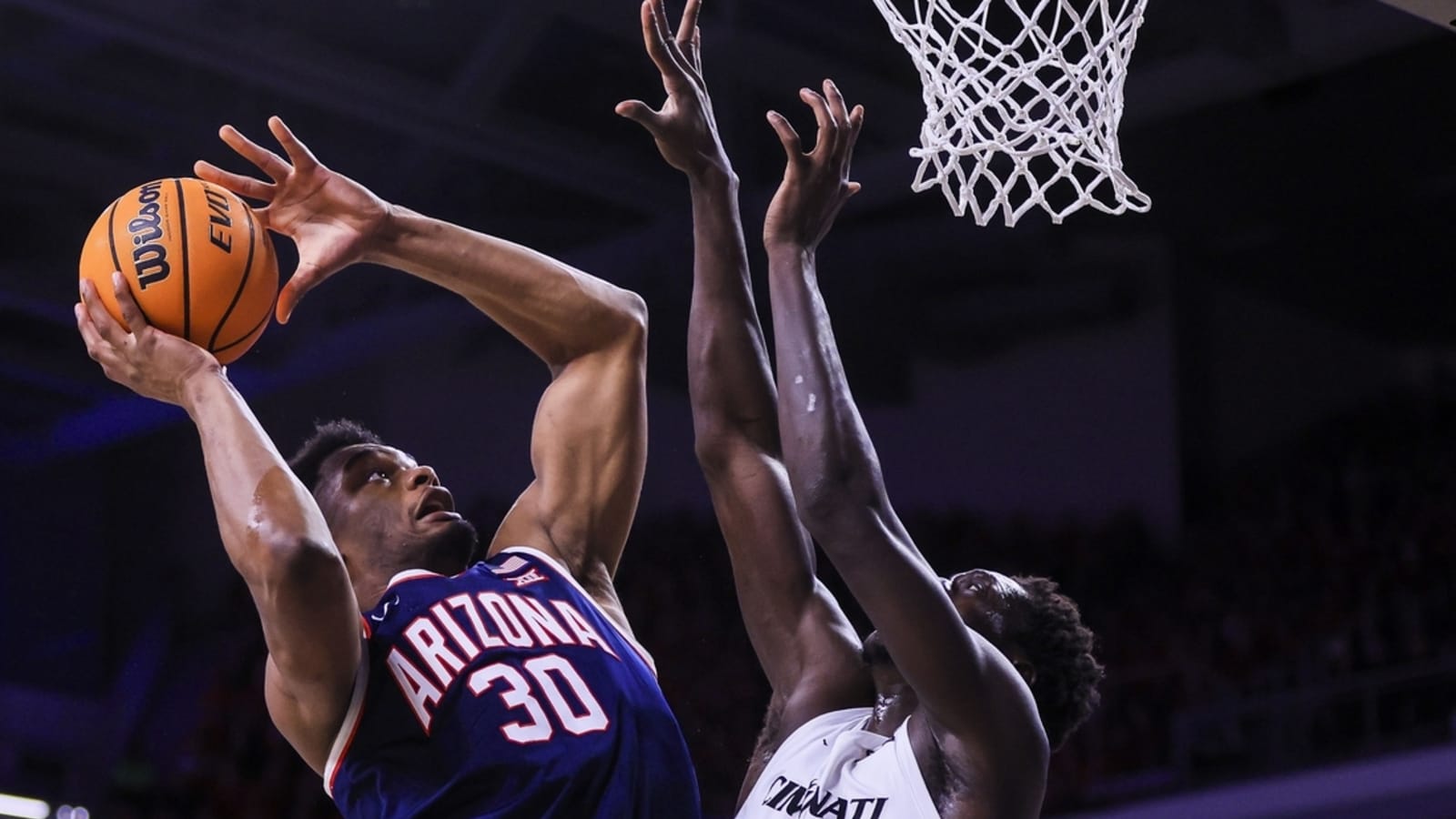 Arizona holds off rally by No. 16 Cincinnati