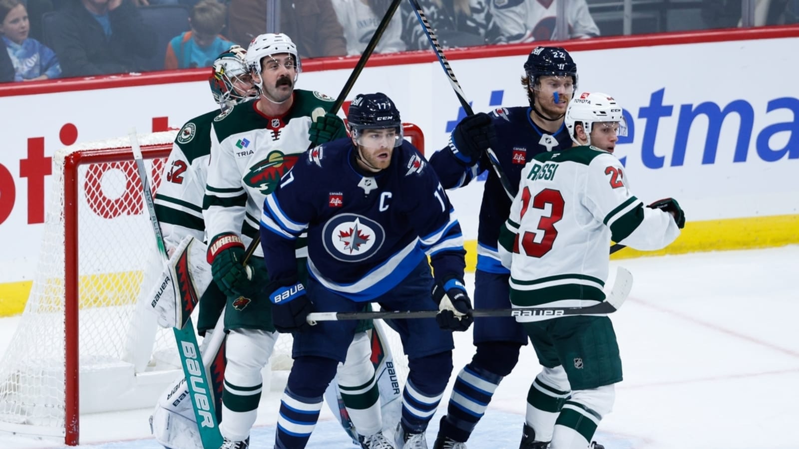 NHL roundup: Jets keep rolling with OT win vs. Wild