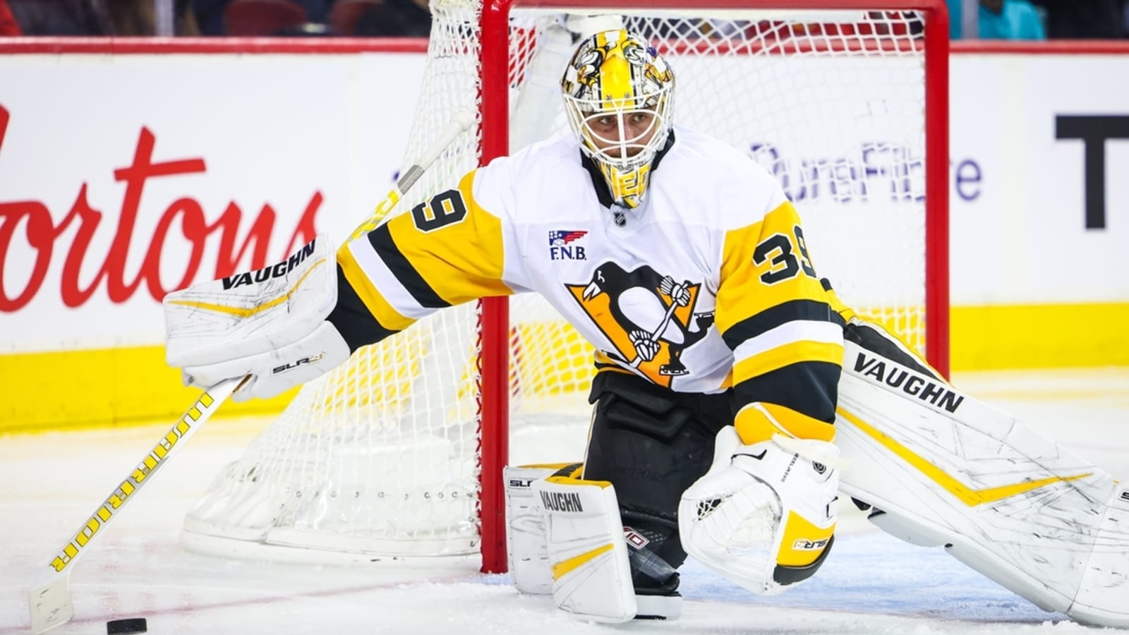 Flames extend point streak with shootout win over Pens