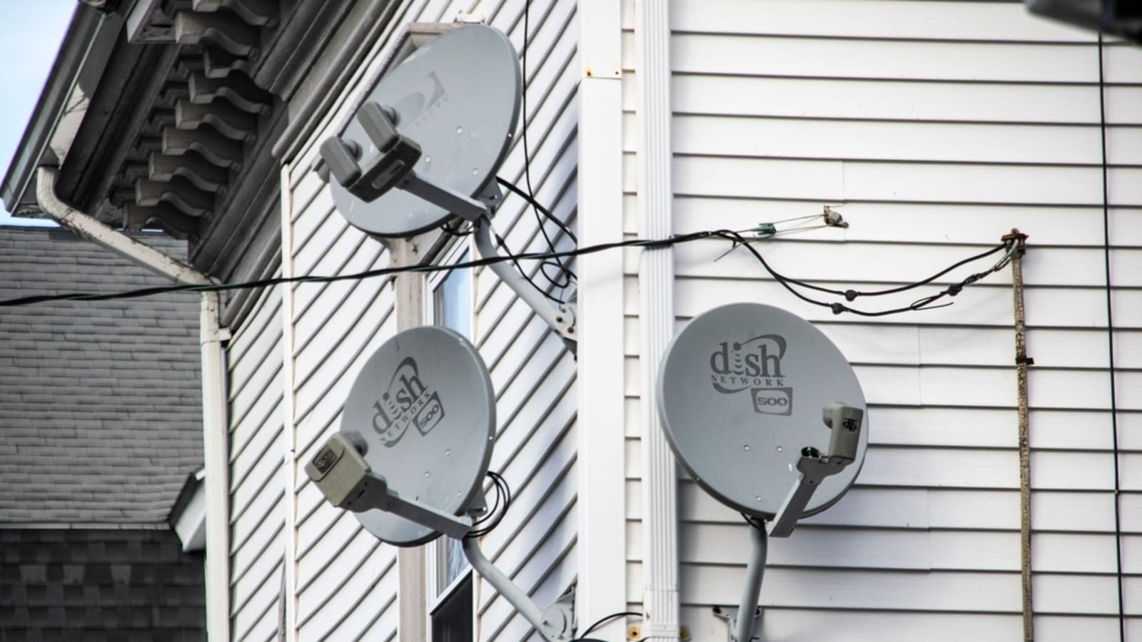 DirecTV agrees to buy Dish Network -- for $1