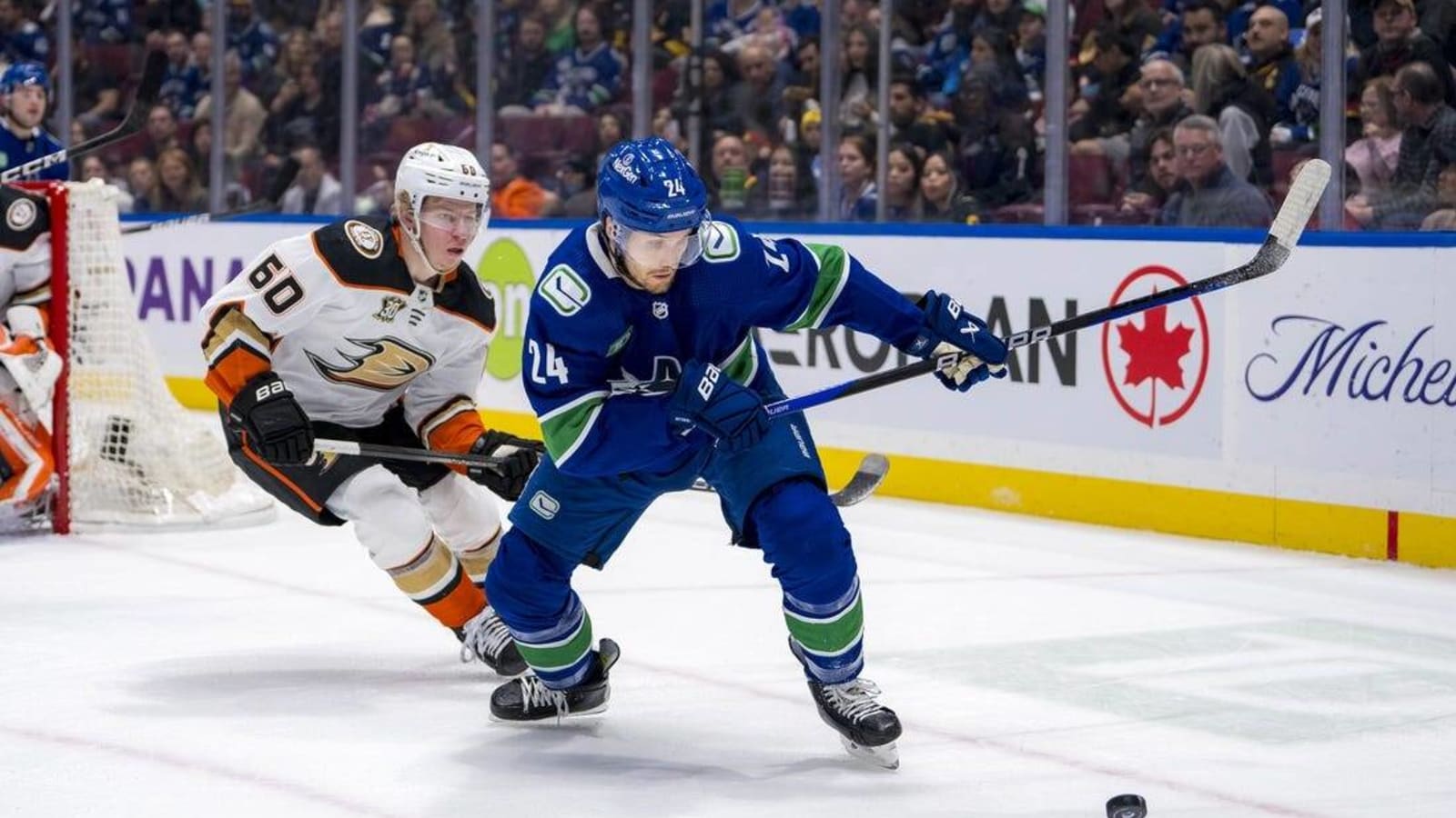 Canucks hold off Ducks with late goal