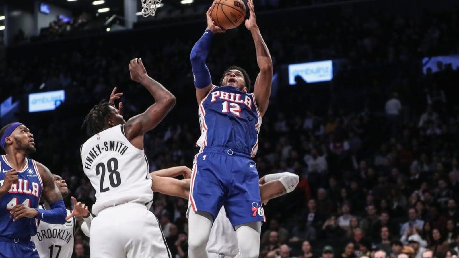 Nets rally, pull off win over short-handed Sixers